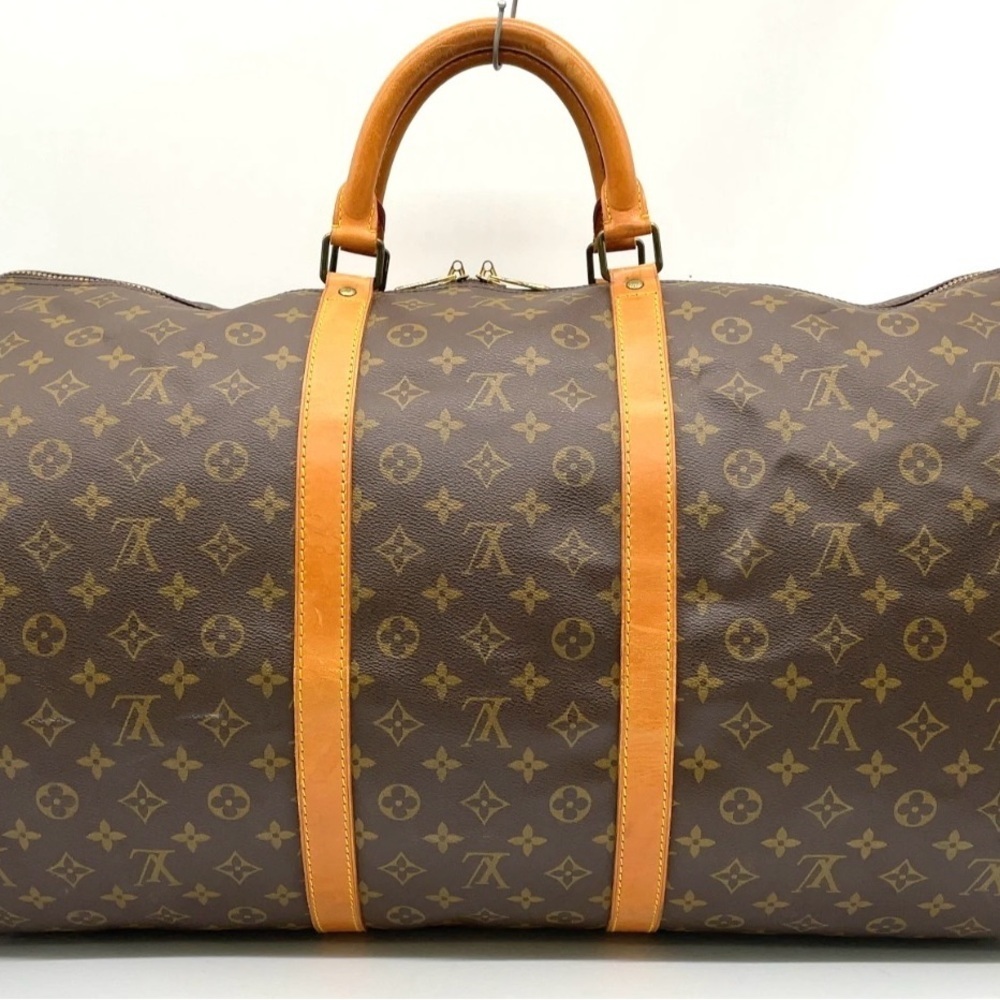 Auth Louis Vuitton Monogram Keepall
60 Boston Bag W/PadLock/Tag